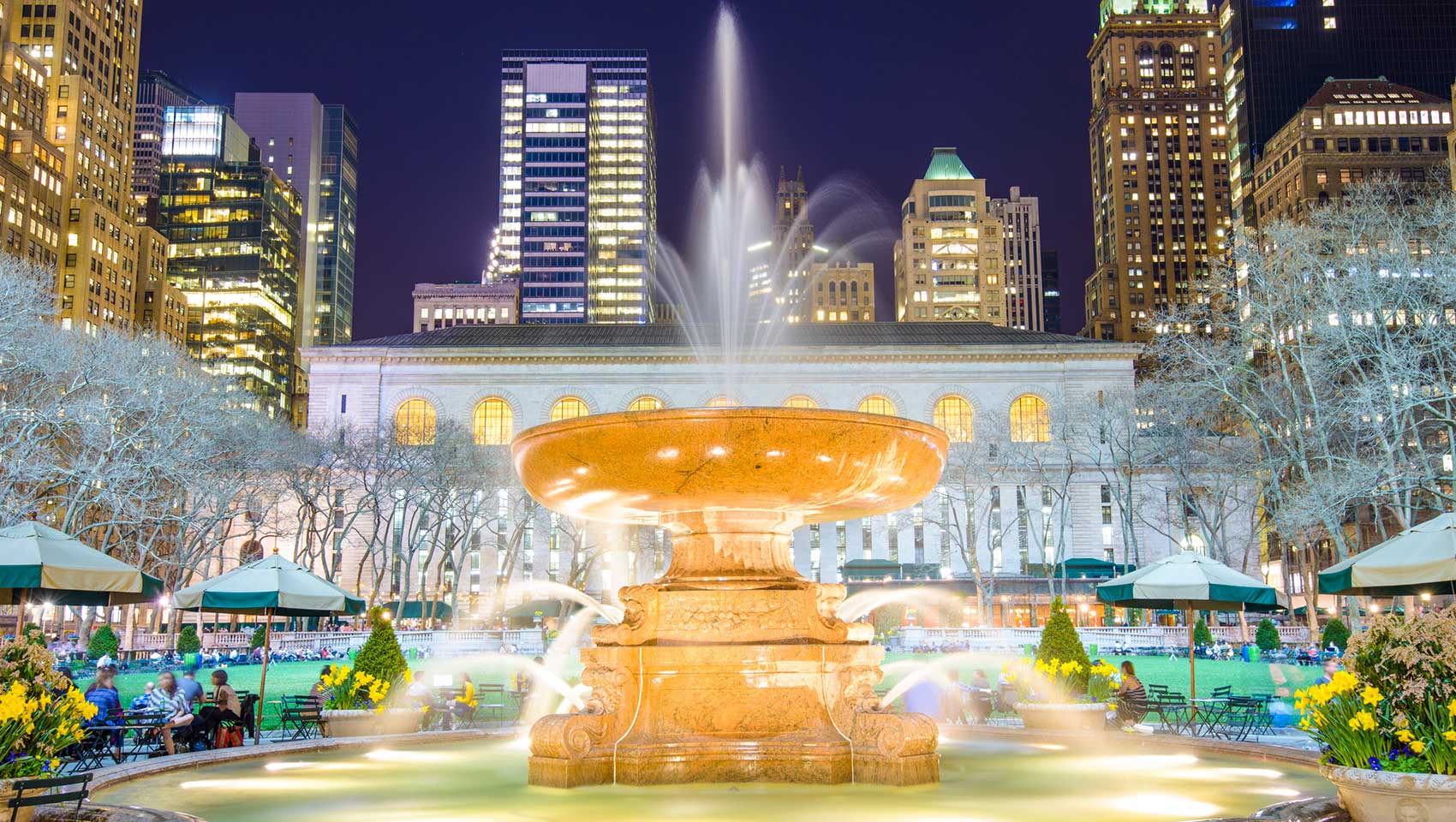 Bryant Park at night with water fountain